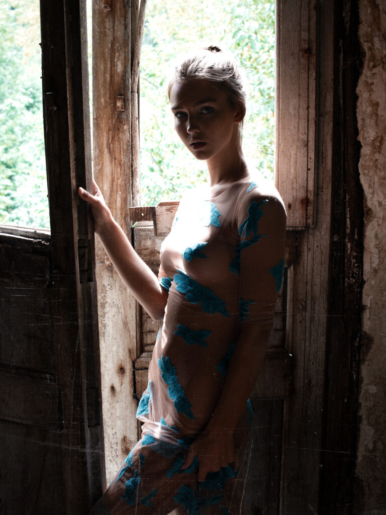 Rachel Cook in the soft window light of an abandoned paper mill in the Valle de Ferriere.